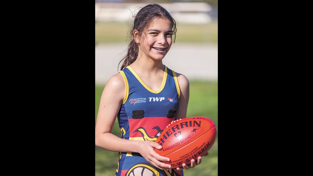 D’Silva Trades Netball Uniform for Football Jersey post image